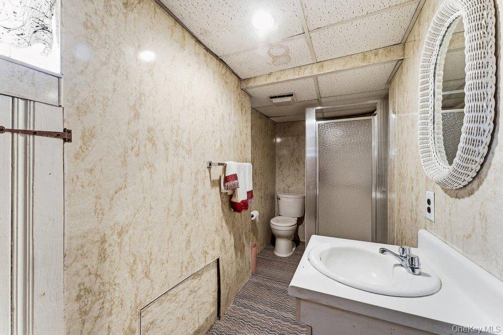 Single Family Woodlawn  Nassau County, NY 11581, MLS-977910-13