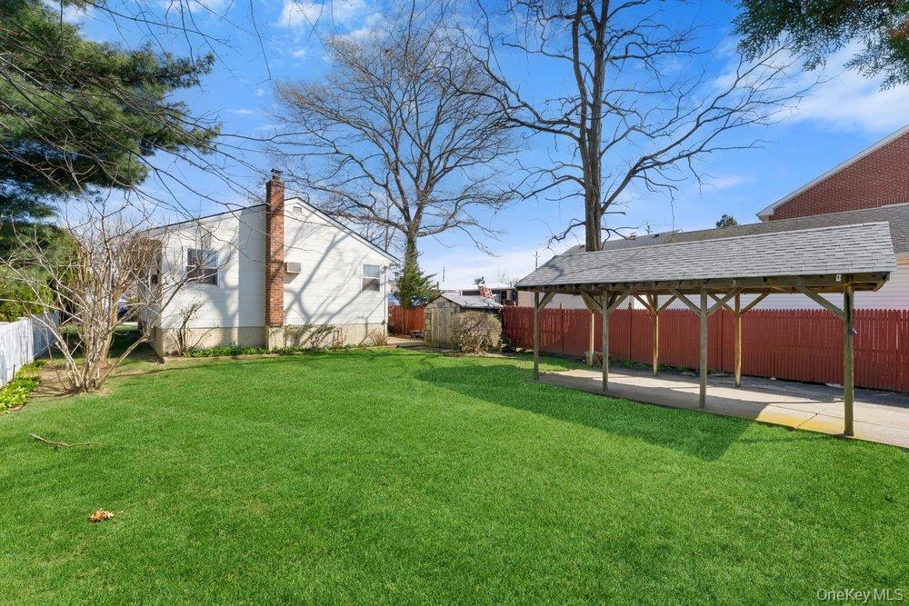 Single Family Woodlawn  Nassau County, NY 11581, MLS-977910-15