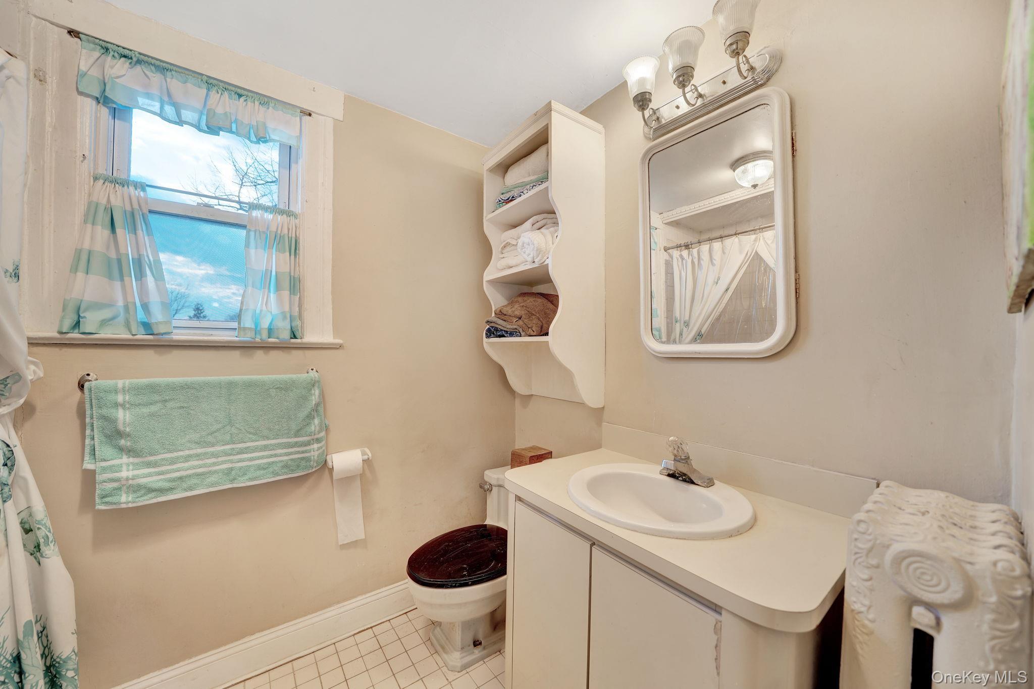 Single Family Bayview  Nassau County, NY 11520, MLS-979987-21