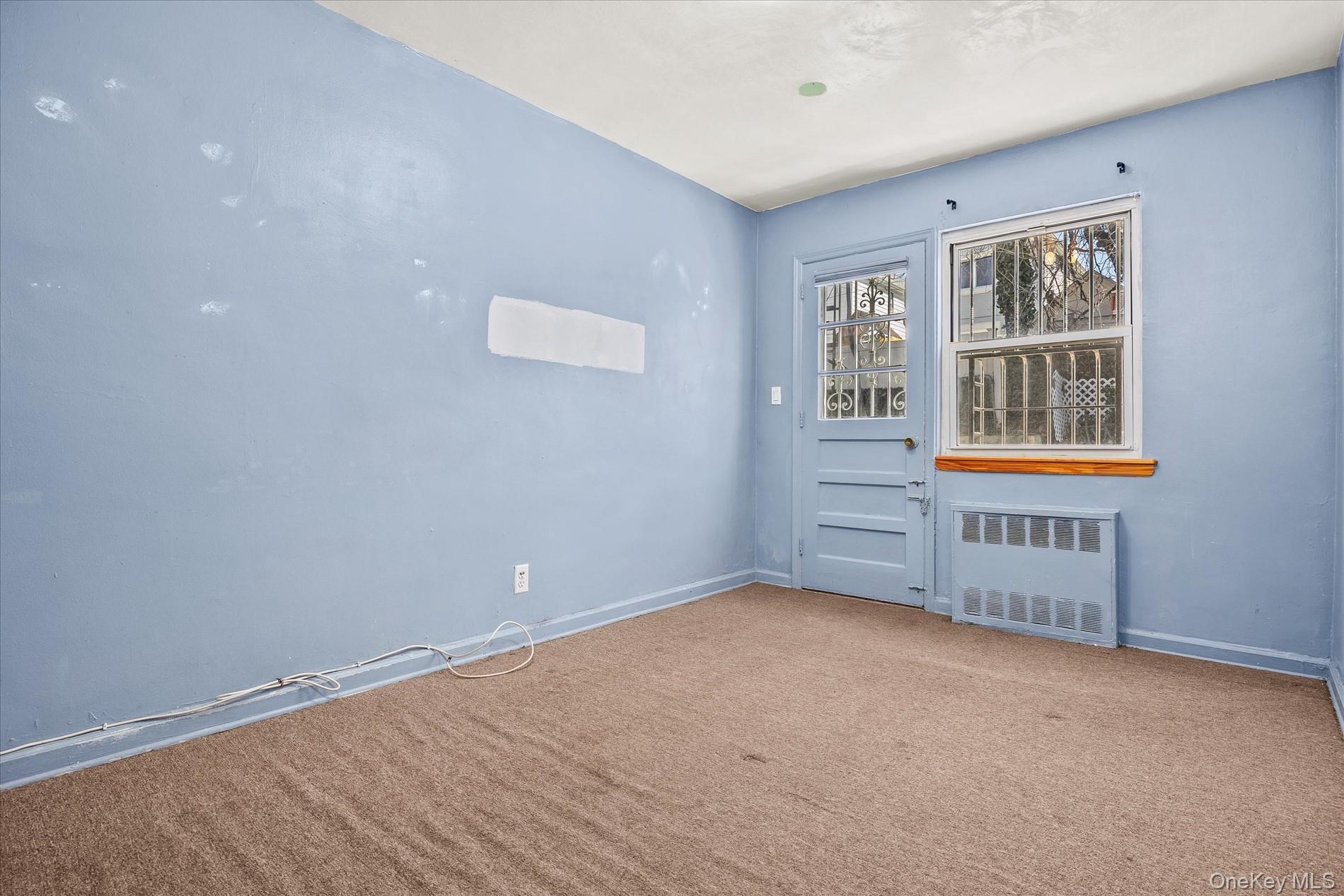 Single Family 65th Place  Queens, NY 11378, MLS-980588-11