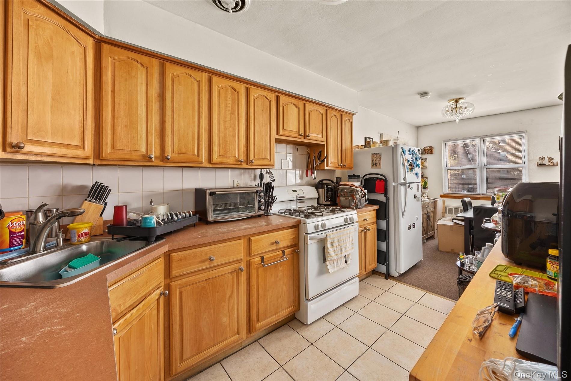 Single Family 65th Place  Queens, NY 11378, MLS-980588-15