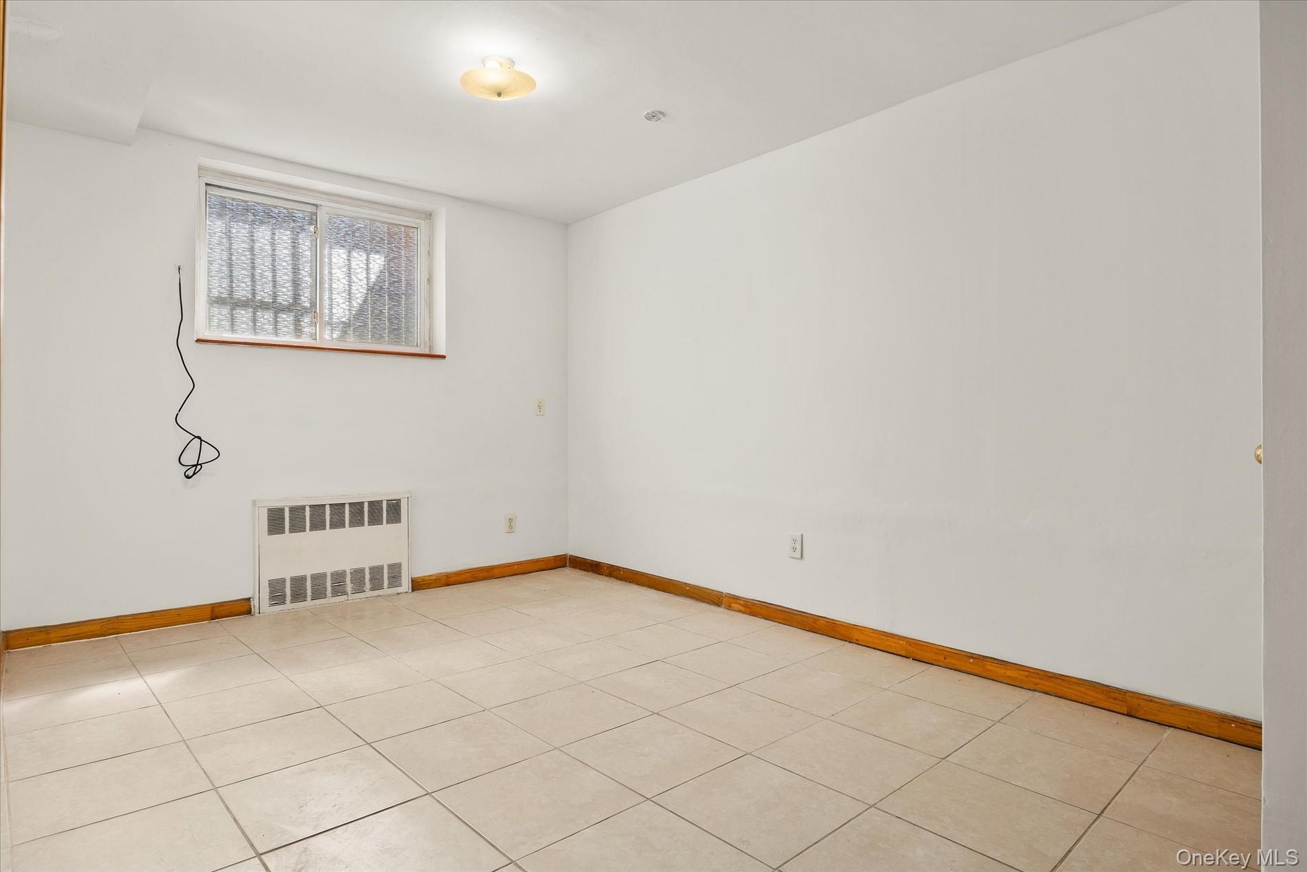 Single Family 65th Place  Queens, NY 11378, MLS-980588-4