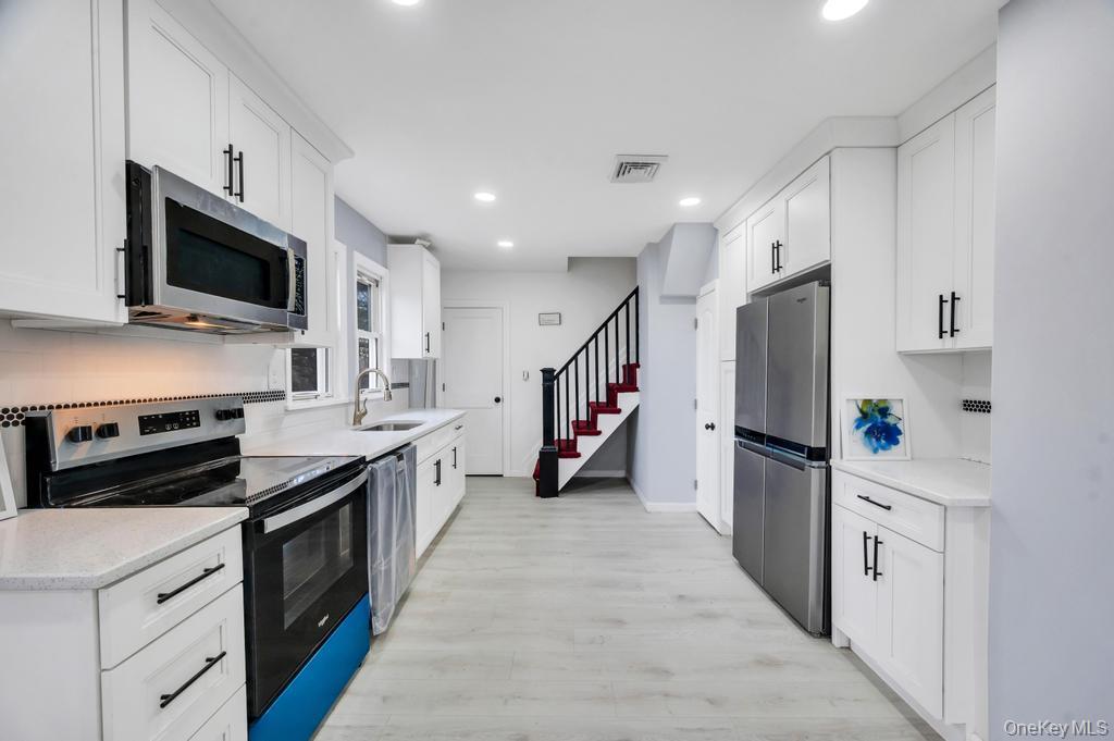 Single Family Adams  Suffolk County, NY 11722, MLS-982428-8