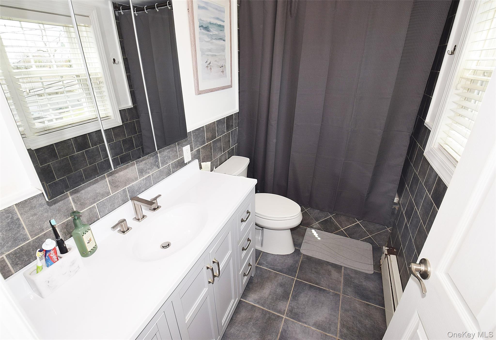 Single Family Lagoon  Suffolk County, NY 11730, MLS-987840-23