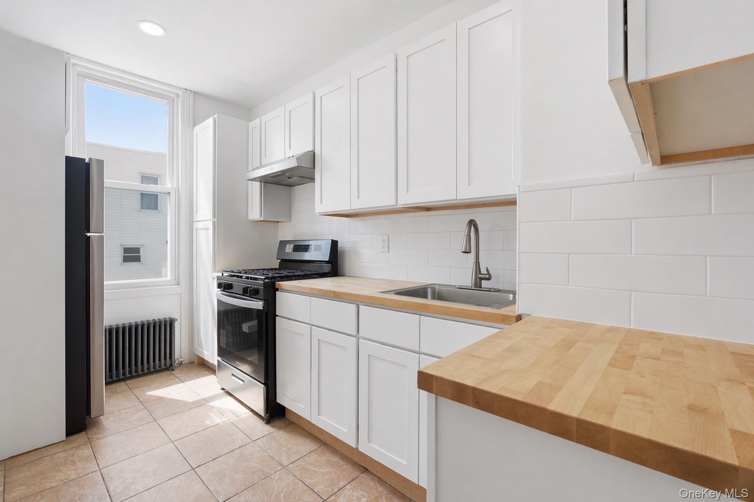 Single Family Cooper  Queens, NY 11385, MLS-989707-6