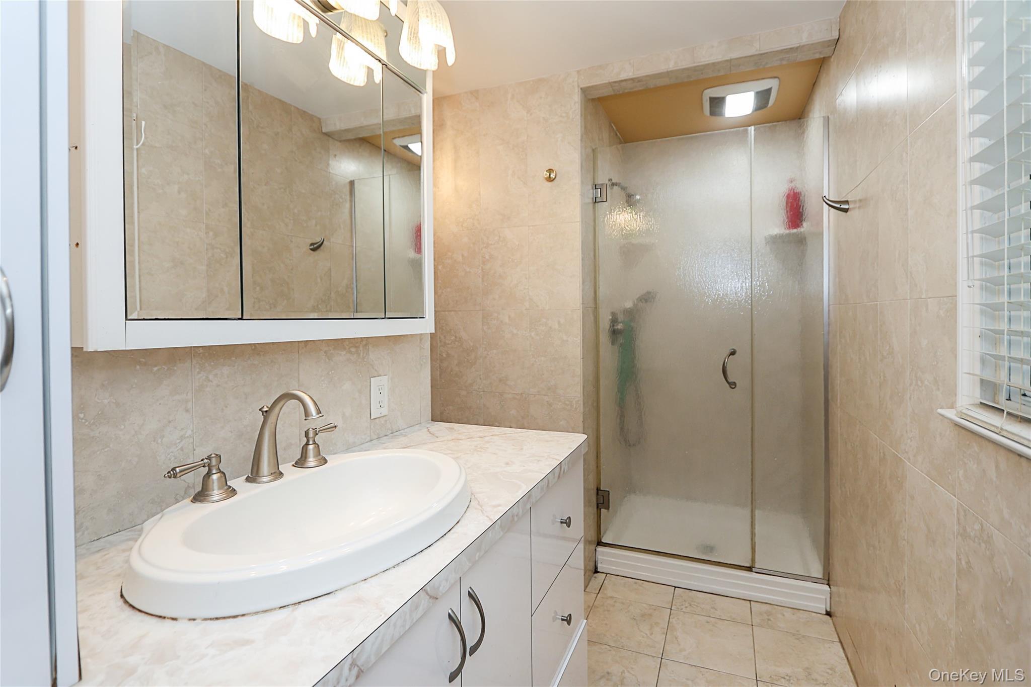 Single Family Ridgefield  Suffolk County, NY 11788, MLS-991705-16
