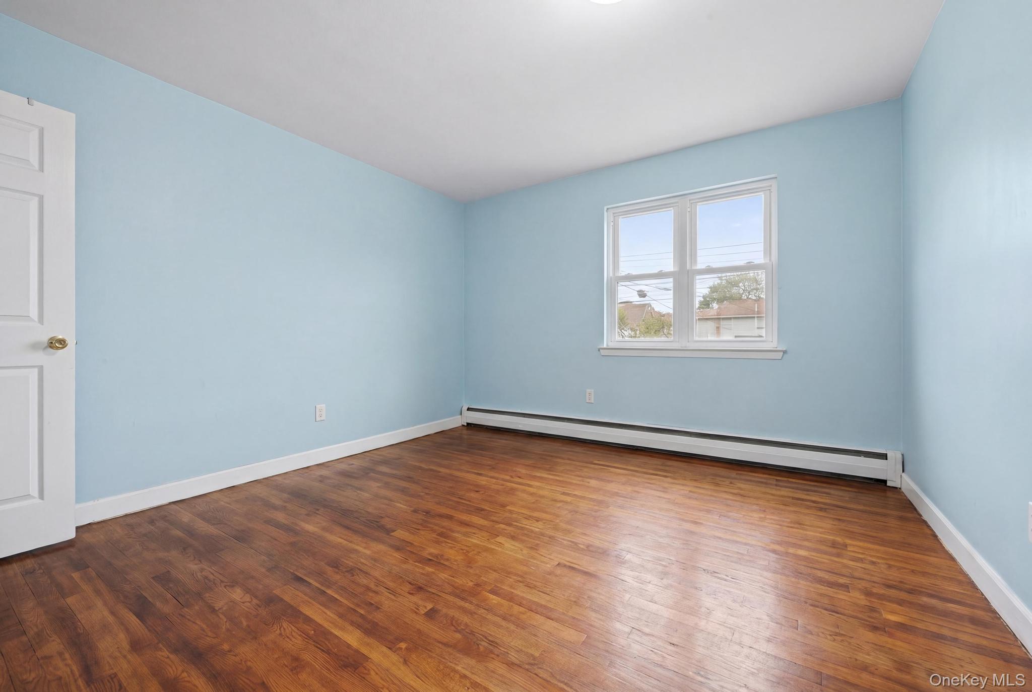 Single Family South Richmond Hill  Queens, NY 11419, MLS-992232-11